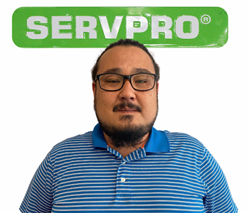 Jay, male, SERVPRO employee, cut out, against a white background, SERVPRO green sign above head