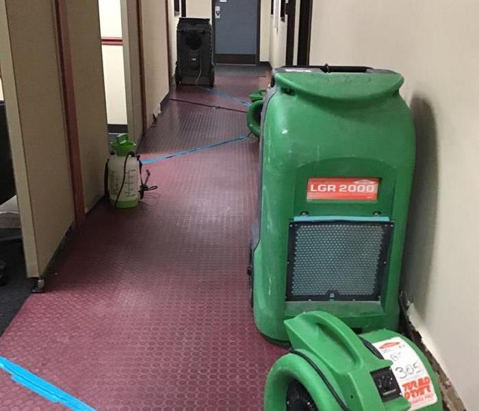 SERVPRO drying equipment in hallway