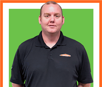 SERVPRO employee Patrick Belcher, male in front of white background